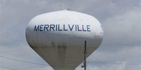 Merrillville water tower with overcast sky in the background