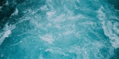 Flowing water representing wastewater movement through a sewer system.